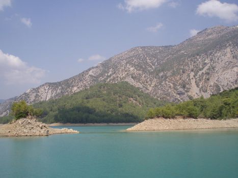 The panoramic view of mountain lake and mountains.