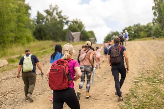 Group of friends hiking in nature in the mountains.