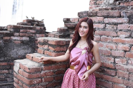 Female in Thai traditional dress at  historical park