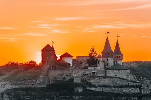 Kamyanets-Podilskiy fortress at sunset, Ukraine