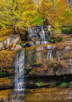 Valley of the Giants and waterfall in the Sofievsky arboretum or Sofiyivsky Park in Uman, Ukraine, on a sunny autumn day