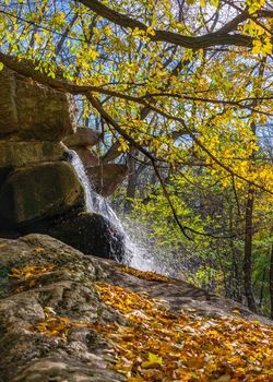 Valley of the Giants and waterfall in the Sofievsky arboretum or Sofiyivsky Park in Uman, Ukraine, on a sunny autumn day