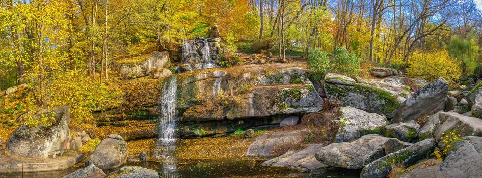 Valley of the Giants and waterfall in the Sofievsky arboretum or Sofiyivsky Park in Uman, Ukraine, on a sunny autumn day