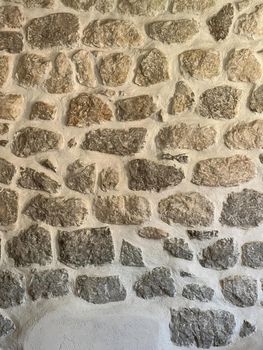 Ancient masonry wall of the building. Close-up. High quality photo