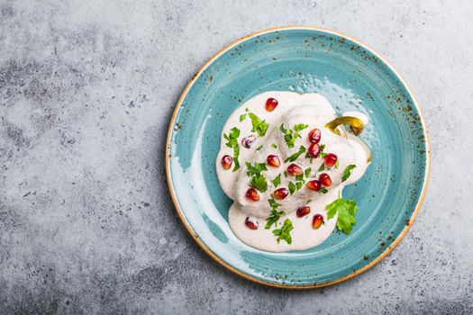 Top view of chiles en nogada, traditional festive dish on Mexican Independence Day. Peppers chili with walnut sauce, appetizer usual for Mexico, for celebration and grand food fiesta. Space for text