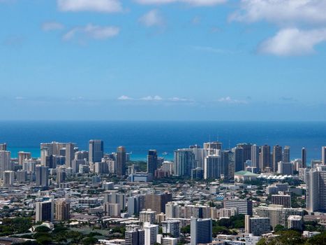 Aerial of  Honolulu, Diamond Head, Waikiki, Buildings, parks, hotels and Condos with Pacific Ocean stretching into the distance on nice day. Taken on August 15, 2013