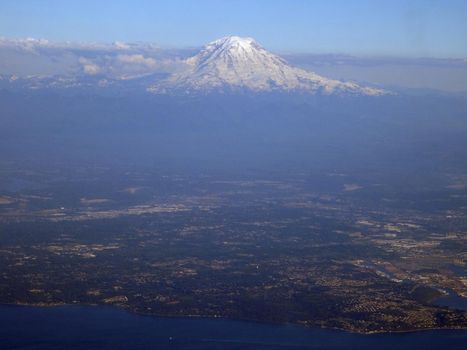 Aerial view Seattle with coast and Mount Rainier visible on June 26, 2016 in Seattle, WA.