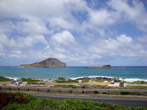 Kaupo Beach Park is located across the street from Sea Life Park Hawaii on Oahu's southeastern shore. It is a narrow roadside beach park with a sandy beach.  