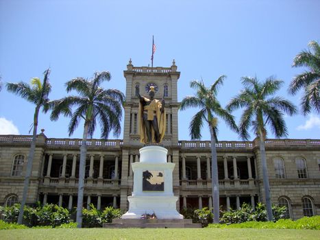 Statue of King Kamehameha in downtown Honolulu, Hawaii.  statue stands prominently in front of Aliʻiolani Hale in Honolulu, Hawaii. The statue had its origins in 1878 when Walter M. Gibson, a member of the Hawaiian government at the time, wanted to commemorate the 100-year arrival of Captain Cook to the Hawaiian Islands. Taken on April 23, 2010.