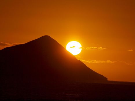 Sunrise over Rabbit (Manana) Island in Waimanalo Bay on Oahu.