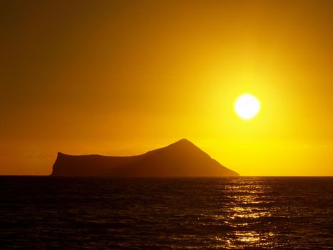 Sunrise over Rabbit (Manana) Island in Waimanalo Bay on Oahu.