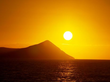 Sunrise over Rabbit (Manana) Island in Waimanalo Bay on Oahu.