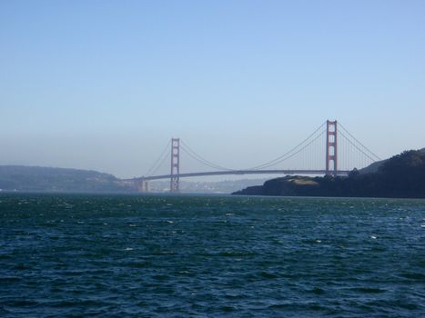 San Francisco Golden Gate Bridge seen from the water bridging San Francisco and Marin County in California.