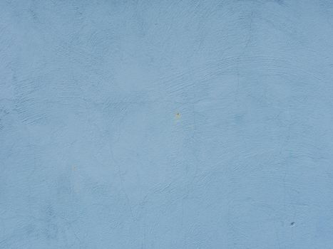 Abstract background from old shabby blue plaster. Design background in blue color for text.