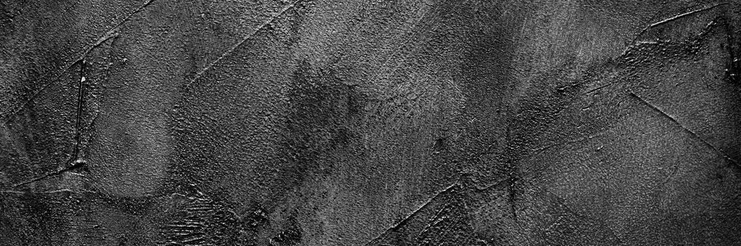 shabby dark gray wall. Dark background with putty texture. Web banner.