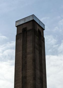 Chimney / tower of decommissioned Bankside Power Station (active 1891-1981), now used as Tate Modern gallery in London.