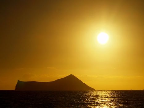 Sunrise over Rabbit (Manana) Island in Waimanalo Bay on Oahu.