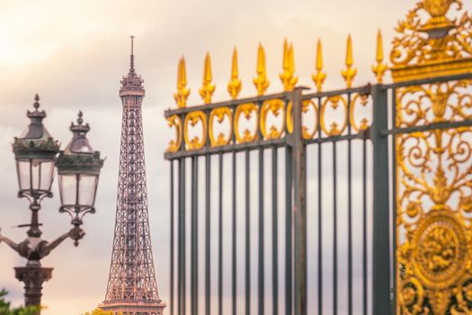 Eiffel tower framed by Place de la Concorde gates, Paris, France