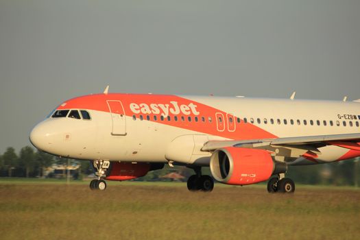 Amsterdam, the Netherlands  - June 1st, 2017: G-EZBW easyJet Airbus A319-100 taking off from Polderbaan Runway Amsterdam Airport Schiphol