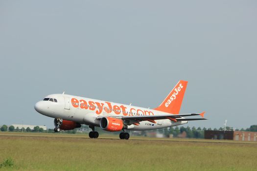 Amsterdam, the Netherlands  -  June 2nd, 2017: G-EZMK easyJet Airbus A319 taking off from Polderbaan Runway Amsterdam Airport Schiphol