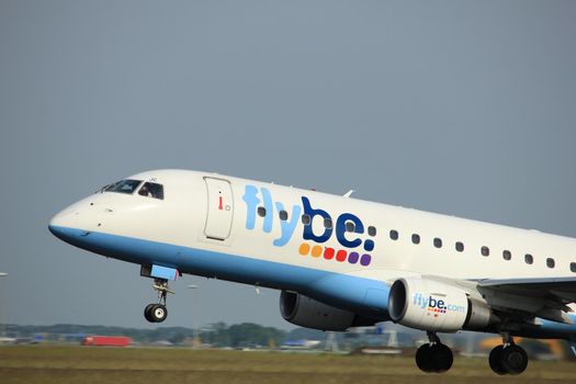 Amsterdam, the Netherlands  -  June 2nd, 2017: G-FBJC Flybe Embraer ERJ-175STD taking off from Polderbaan Runway Amsterdam Airport Schiphol