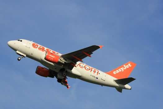 Amsterdam, the Netherlands  -  June 2nd, 2017: G-EZBJ easyJet Airbus A319 taking off from Polderbaan Runway Amsterdam Airport Schiphol