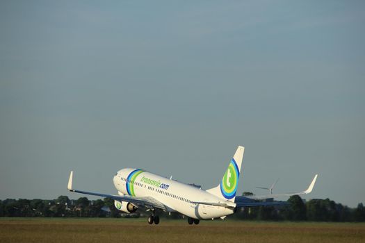 Amsterdam, the Netherlands  - June 1st, 2017: PH-HZN Transavia Boeing 737-800 taking off from Polderbaan Runway Amsterdam Airport Schiphol