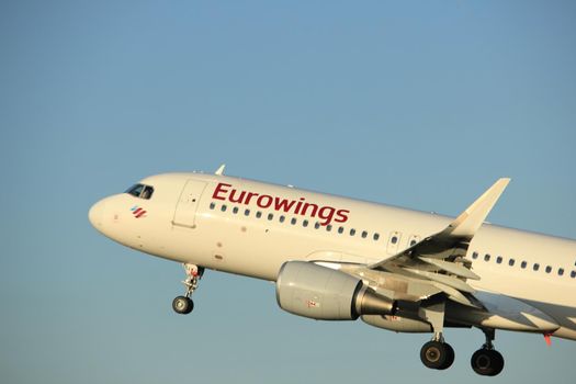 Amsterdam, the Netherlands  - June 1st, 2017: D-AEWJ Eurowings Airbus A320-200 taking off from Polderbaan Runway Amsterdam Airport Schiphol