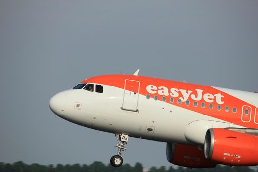 Amsterdam, the Netherlands  -  June 2nd, 2017: G-EZDJ easyJet Airbus A319 taking off from Polderbaan Runway Amsterdam Airport Schiphol