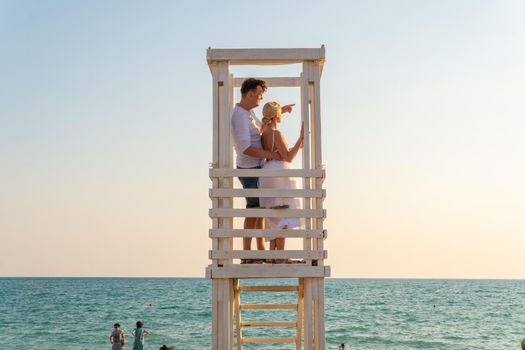 Love lifeguard girl pair guy tower paradise sunrise ocean safety, concept surf saving for shore for security blue, wooden australia. Recreation chair hut,