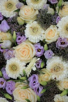 Purple and white wedding flowers, table centerpiece for a wedding