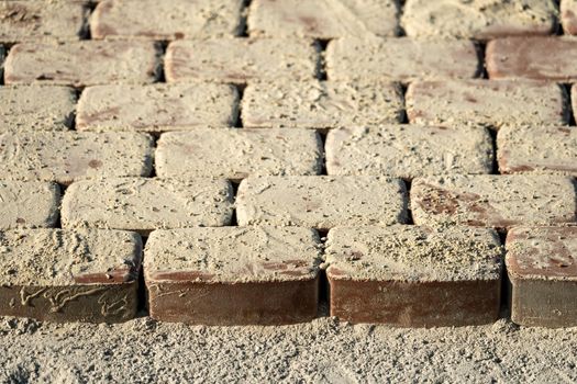 Abstract photo of bricks in the sunlight