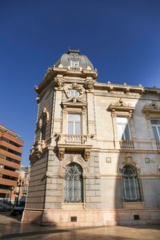 Cartagena, Murcia, Spain- July 17, 2022: Beautiful and colossal town hall of Cartagena city on a sunny day of summer