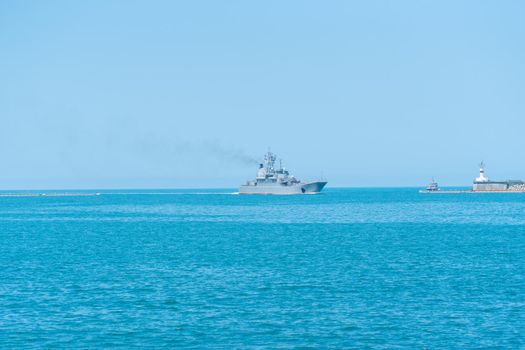 RUSSIA, CRIMEA - JUL 08, 2022: Russian group sevastopol military navy russia day sky city battleship, for boat vessel in warship and armed force, security dock. Cruiser federation metal,