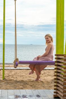 Swing happy sea summer beach travel woman leisure vacation tourist, for place concept in tropical from relaxation paradise, lifestyle ocean. Happiness calm inspiration,