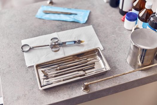 Dental professional equipment on a table of modern clinic