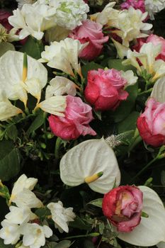 Mixed flower arrangement: various flowers in different colors for a wedding