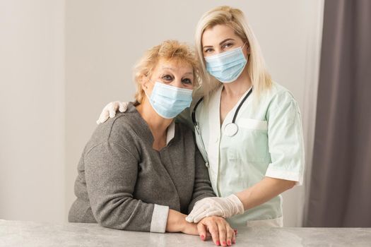 Senior woman with her home caregiver.