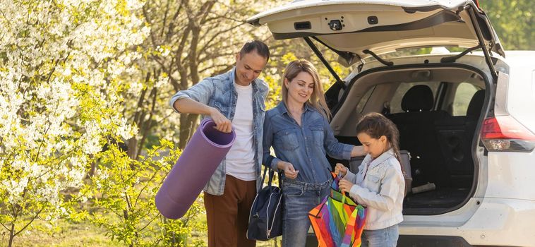 happy family enjoying road trip and summer vacation