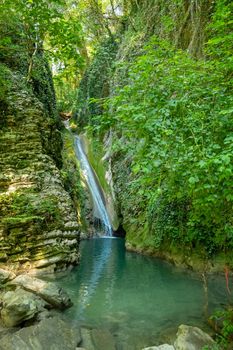 Stunning waterfalls and a blue lagoon lake in the small village Krushuna, Bulgaria.