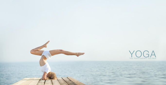 Beautiful blond woman practicing yoga at seashore and meditating