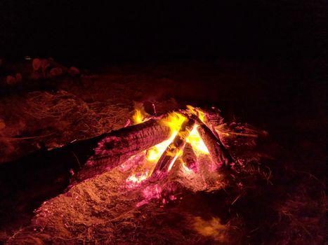 Fire Pit in the Sand burns bright on the beach in Hawaii.