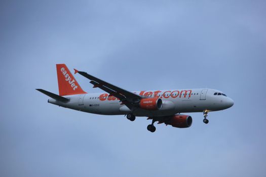 Amsterdam, the Netherlands - June 22nd 2017: G-EZUZ easyJet Airbus A320 approaching Polderbaan runway at Schiphol Amsterdam Airport, the Netherlands