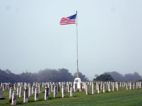 USA Flag waves above the Maui Veterans Cemetery on Maui, Hawaii.