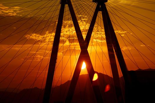 Las Vegas, Nevada - June 27, 2015: Sunrise through The High Roller Wheel at dawn at the center of the Las Vegas Strip. The High Roller is the world's largest observation wheel.