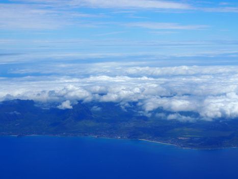 Aerial of West Oahu, Clouds, and Ocean on a beautiful day.