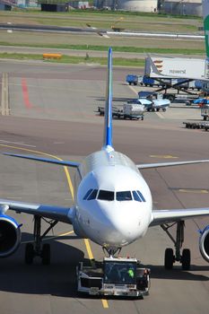 Amsterdam The Netherlands -  May 26th 2017: D-ABDB Small Planet Airlines Germany Airbus A320 pulled back from the gate at Schiphol International Airport