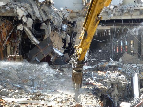 Honolulu - November 6, 2013: Sears store is demolished to make way for new shopping wing at Ala Moana Shopping center with rubble and wires hanging on Oahu, Hawaii.