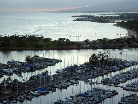 Honolulu - May 7, 2017: Aerial of Ala Wai Harbor and Ala Moana Beach Park at Sunset.