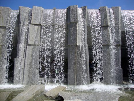 San Francisco - July 11, 2010:  Waterfall at Martin Luther King, Jr. Memorial at Yerba Buena Gardens.  The vision of peace and international unity is enshrined in this memorial featuring a majestic waterfall and shimmering glass panels inscribed with Dr. King’s inspiring words, poems and images from the civil rights movement. Artist and sculptor, Houston Conwill, created this memorial in collaboration with poet Estella Conwill Majoza and architect Joseph De Pace.                   